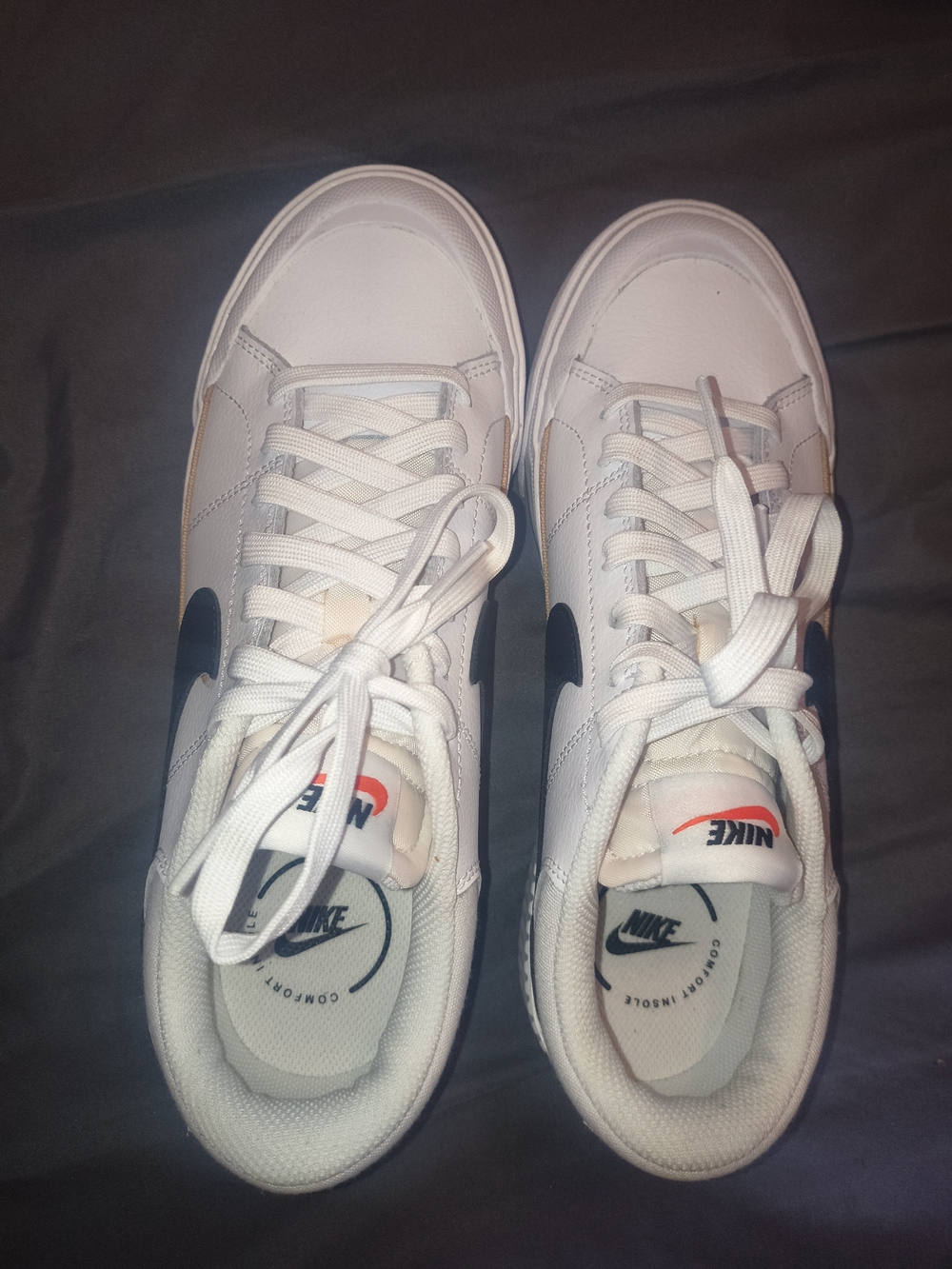 Nike White Low-Top Sneakers with Navy Swoosh